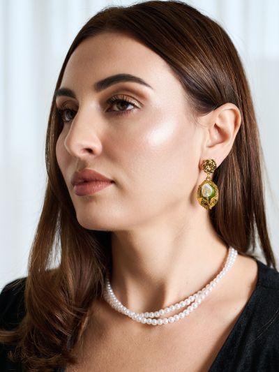 Cercei statement cu floare aurie verde